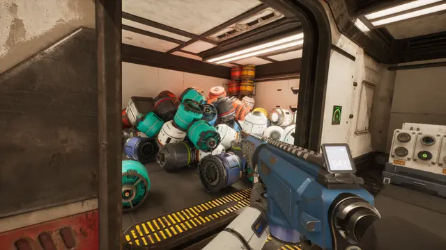 A storage room piled with round canisters in many colors in The Last Caretaker.