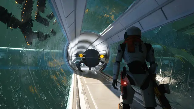 A Caretaker walking through an underwater glass passage in The Last Caretaker.